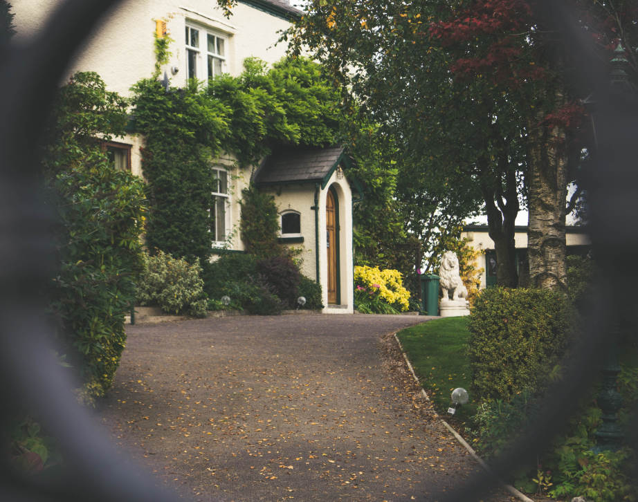 Image of property through a gate.